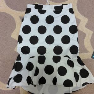 Pencil polka dot skirt with ruffle bottom